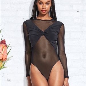 Fleur du Mal fishnet bodysuit